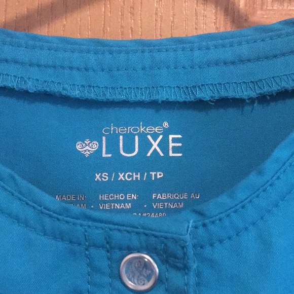 Cherokee Luxe Snap Front Warm Up Jacket in teal - Picture 5 of 5